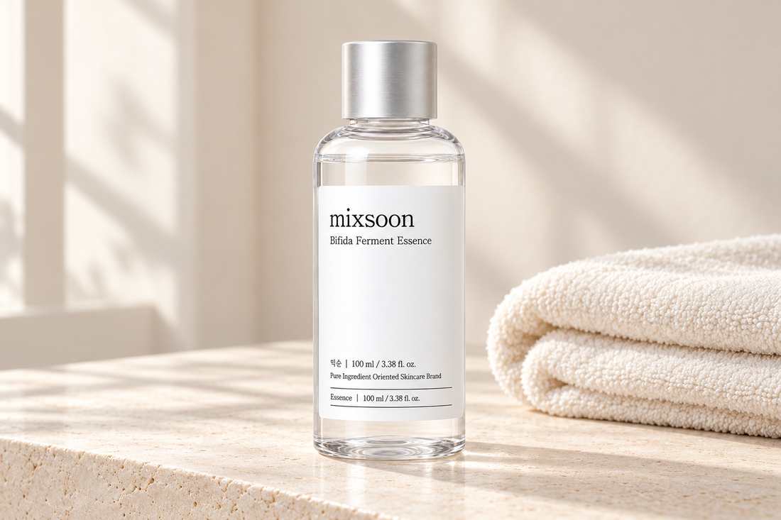 Mixsoon Bifida Ferment Essence bottle on a warm beige vanity