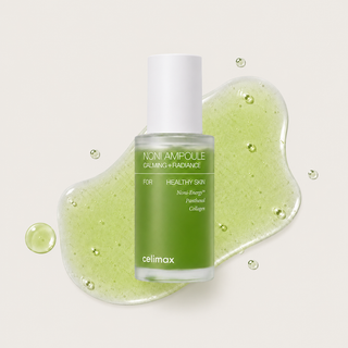 Woman applying Celimax The Real Noni Energy Ampoule to her face