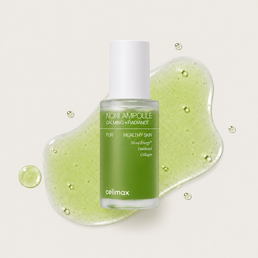 Woman applying Celimax The Real Noni Energy Ampoule to her face