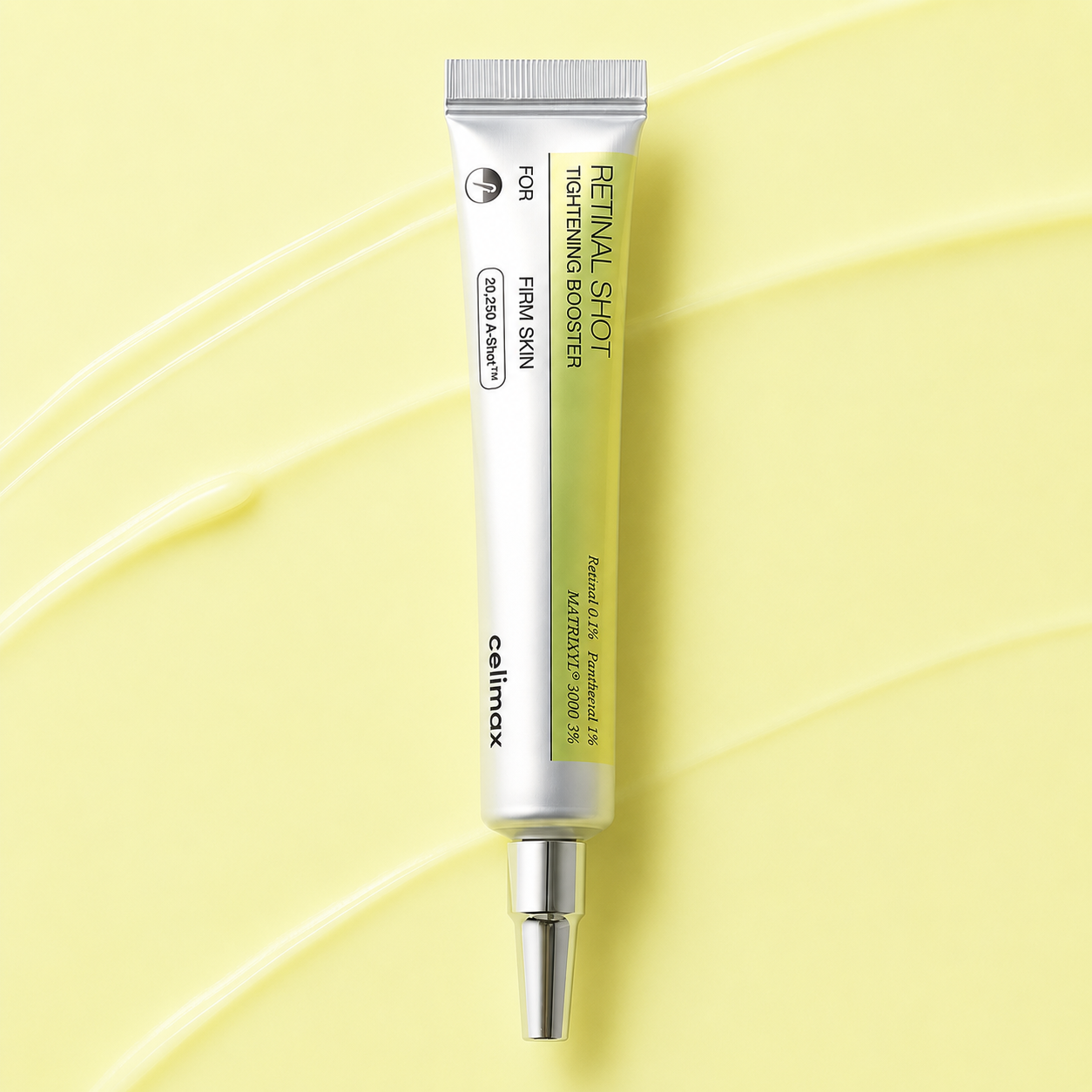 Celimax Vita-A Retinal Shot Tightening Booster tube on a yellow-lime skincare background