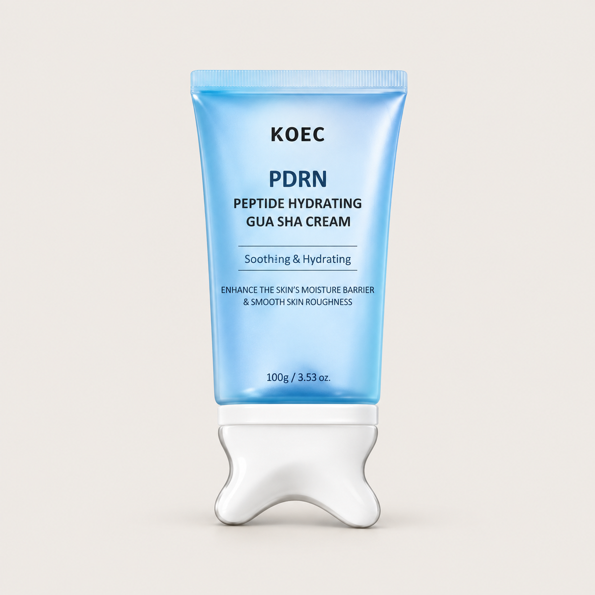 Blue KOEC PDRN Peptide Hydrating Gua Sha Cream tube with a silver-white built-in applicator on an ivory background