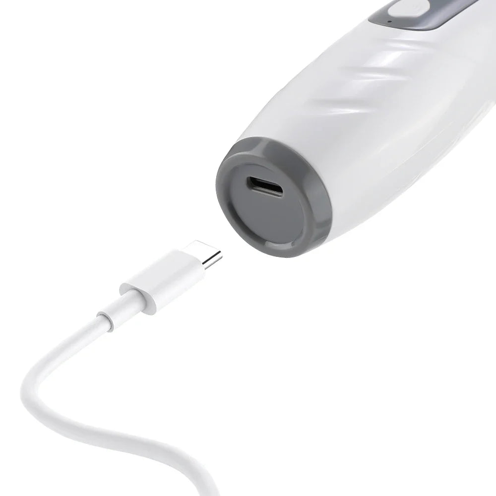 USB-C charging port on the base of the white scalp comb