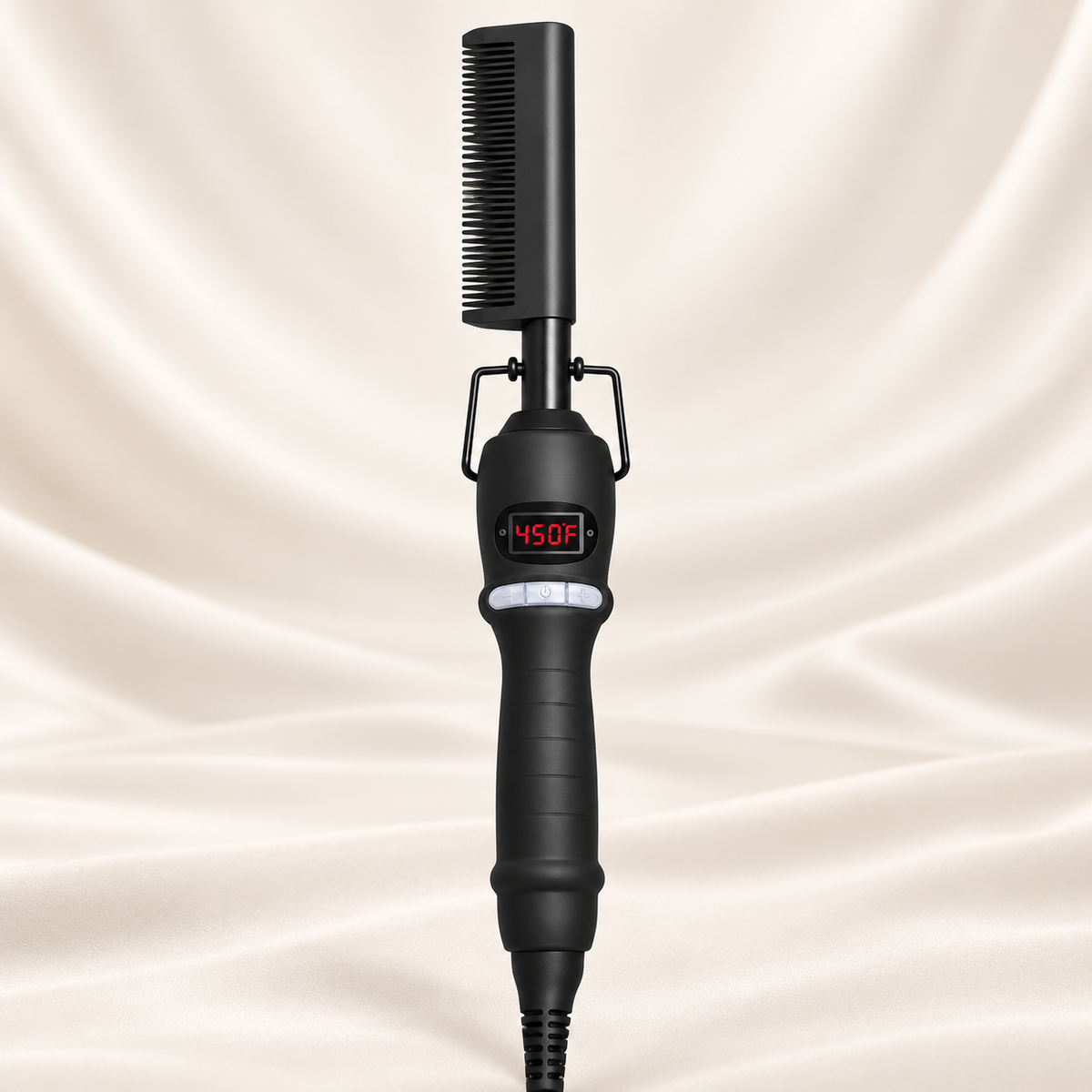 Black digital hot comb with 450F display and wire stand on beige satin
