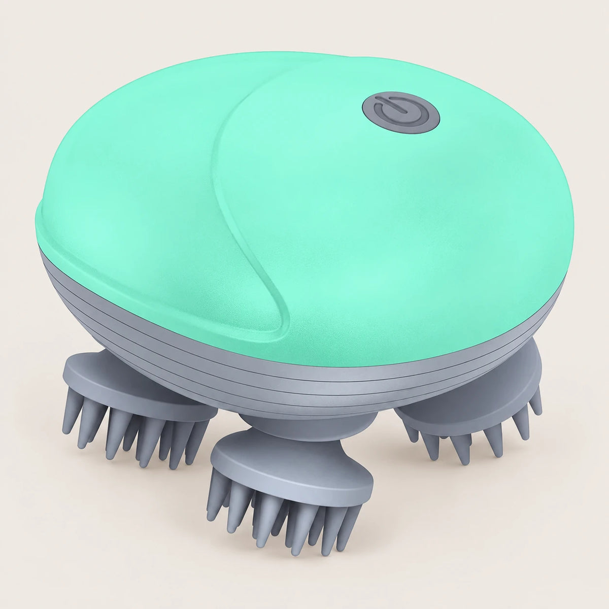Green electric scalp massager with four grey silicone kneading heads on a light beige background