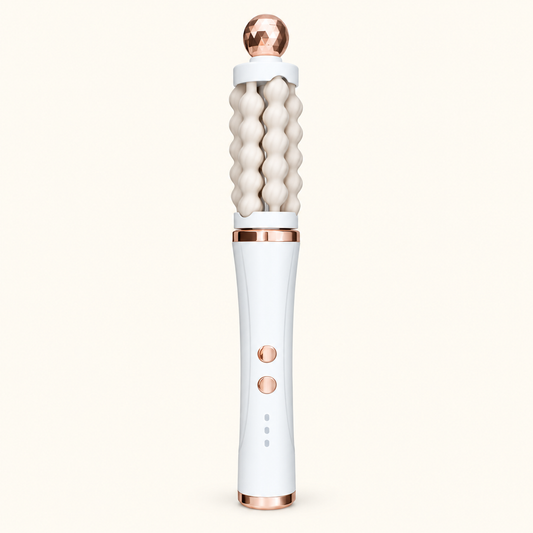 White 3D Wave rotating facial massager with cream fluted rollers and rose-gold-toned accents