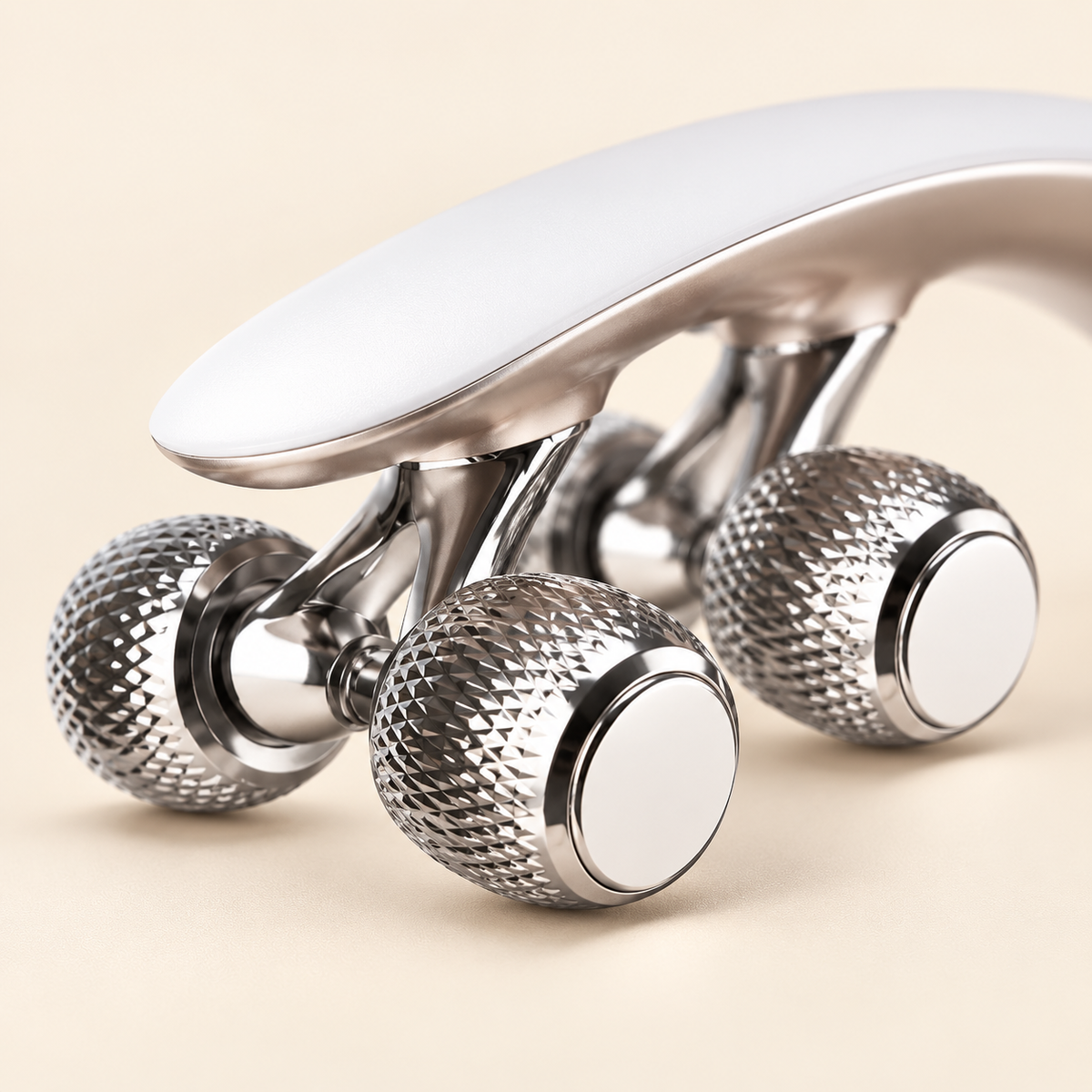 Illustrative macro view of textured silver-tone rollers and the white support arm