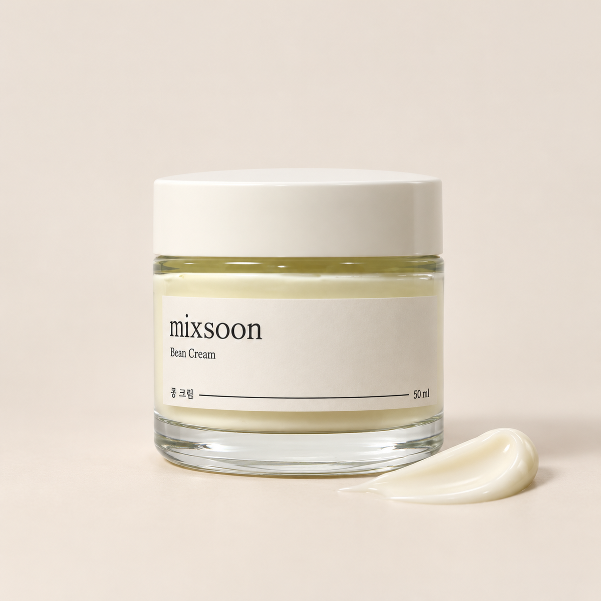 Mixsoon Bean Cream 50 ml jar with ivory cream texture on a warm beige background