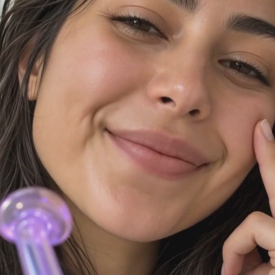 High-frequency wand: 4 glass tips on 4 zones — mushroom on cheeks, tongue around the nose, bent on the jawline, comb on the scalp