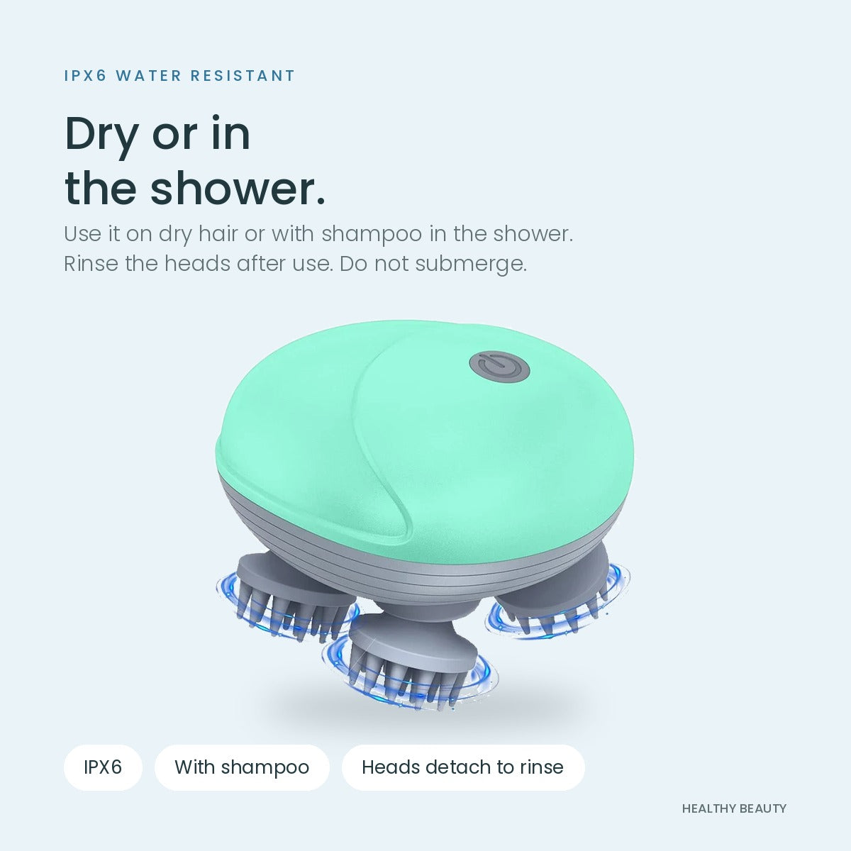 Green electric scalp massager, IPX6 water resistant for dry use or in the shower with shampoo; heads detach to rinse