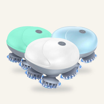 Electric scalp massager in green, white and blue